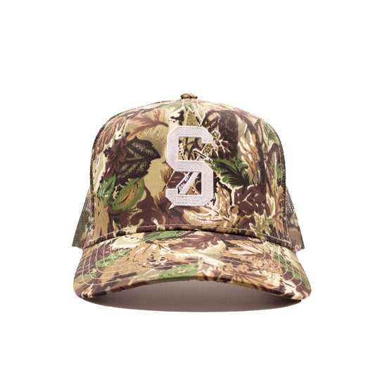 SANCTIONS STAPLE TRUCKER HAT - CAMO